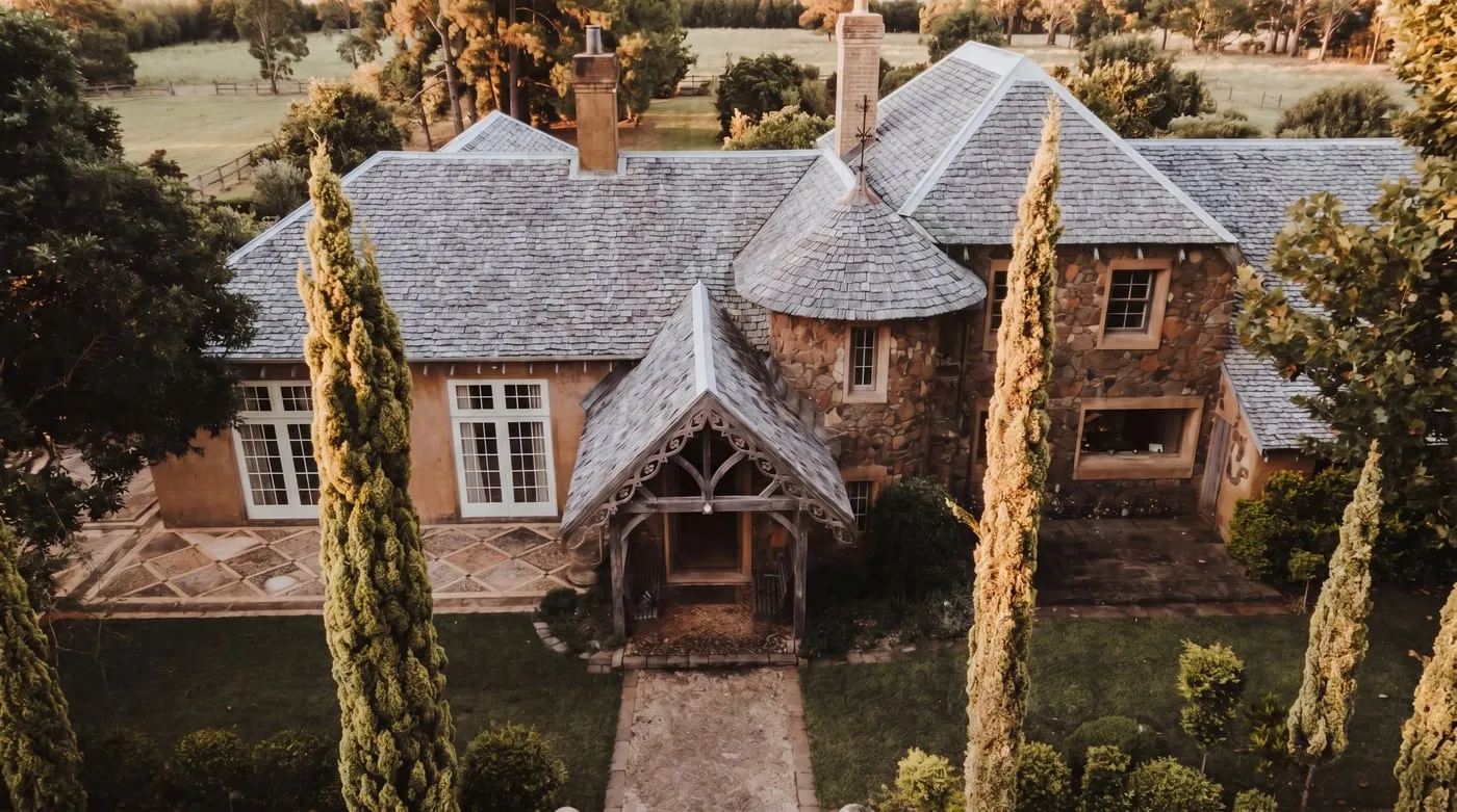 The same slate roof restored after professional soft-wash roof cleaning